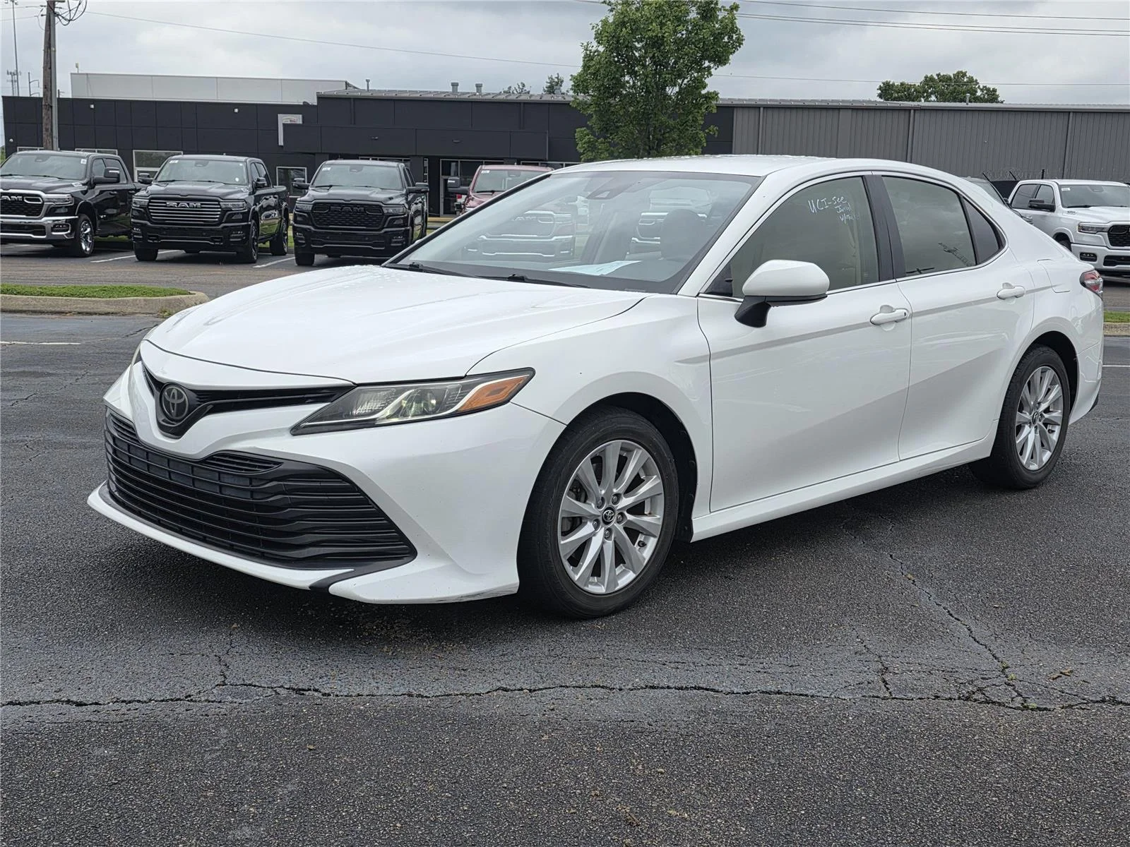Used 2018 Super White Toyota LE image 1