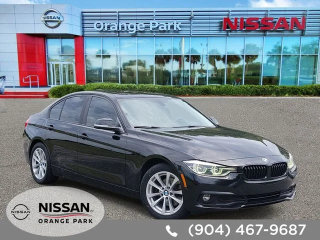 Used 2018 Black BMW 320i xDrive image 1