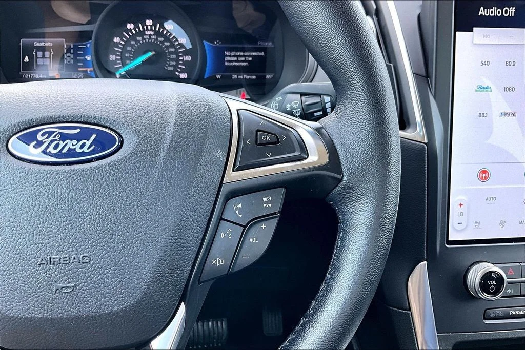 Certified Used 2024 White Metallic Ford Titanium image 19