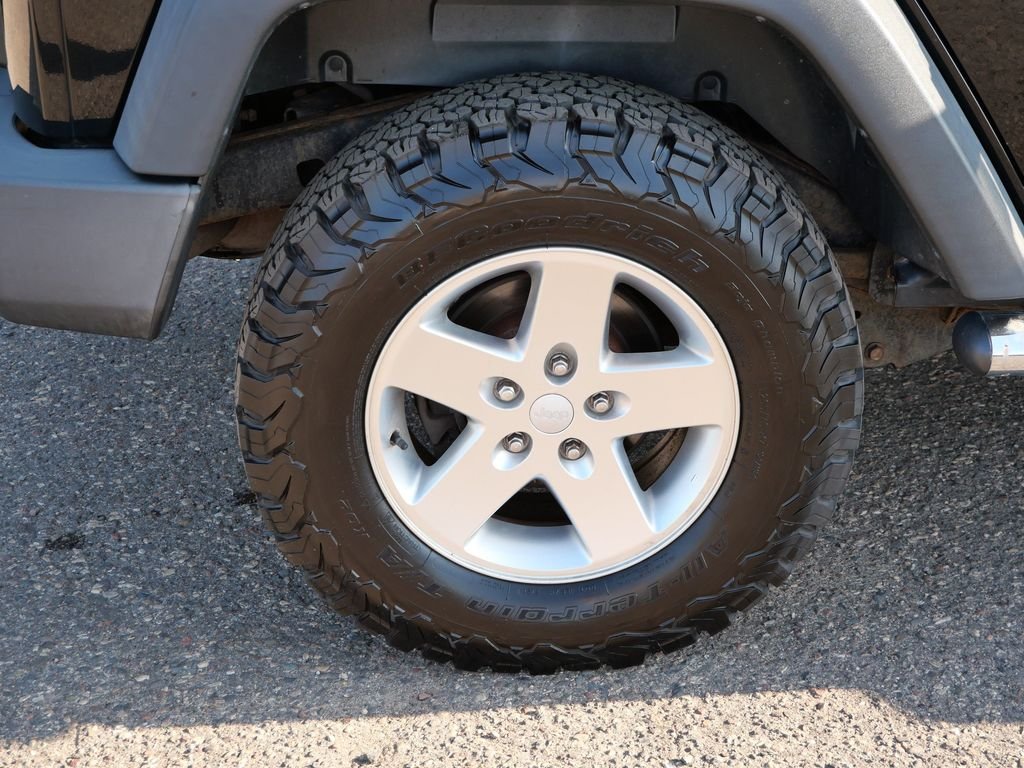 Used 2013 Black Jeep Unlimited Sport image 7