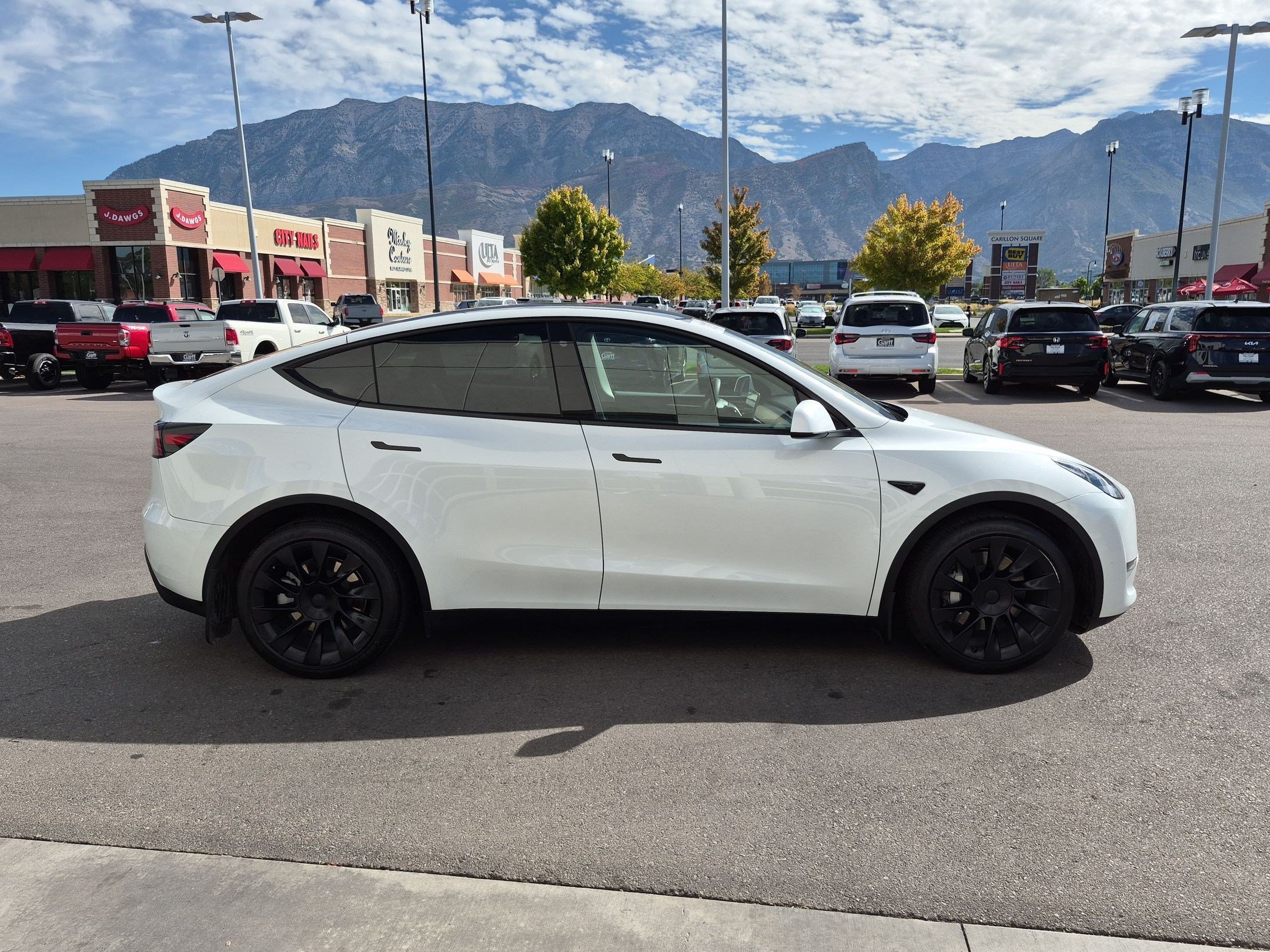 Used 2023 Tesla Model Y Long Range with VIN 7SAYGDEE5PF661337 for sale in Orem, UT