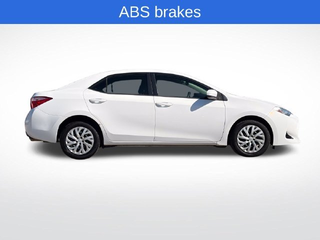 Used 2017 Super White Toyota LE image 4