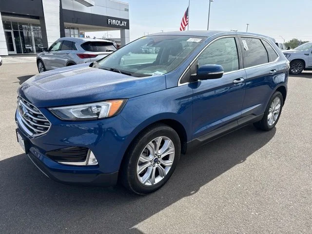 Used 2021 Blue Ford Titanium image 1