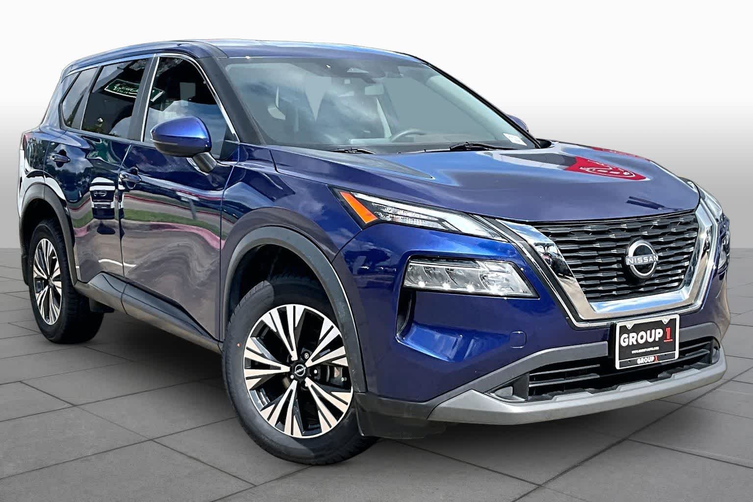 Used 2023 Caspian Blue Metallic Nissan SV image 4