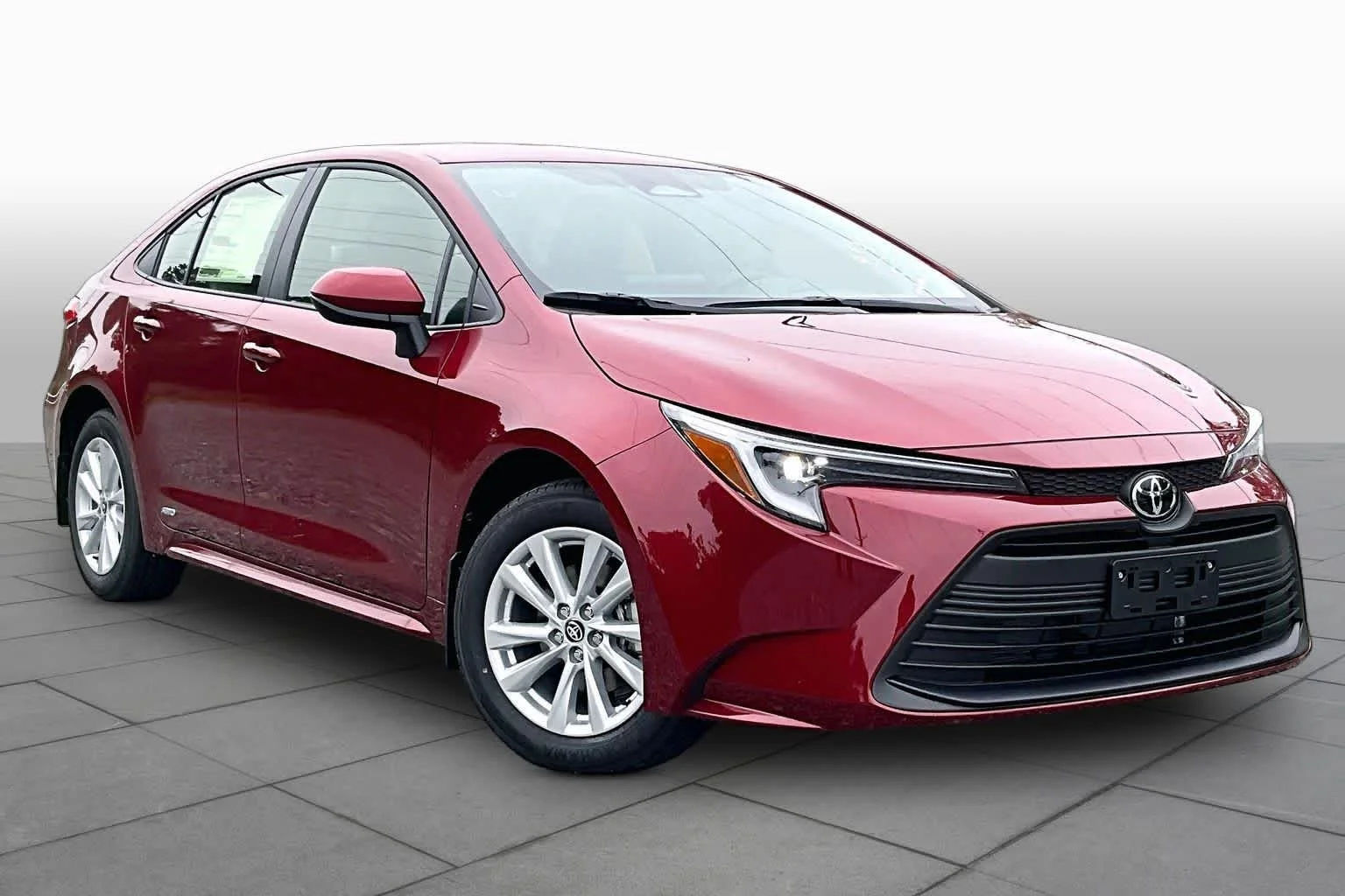 New 2026 Ruby Flare Pearl Toyota Hybrid LE image 2