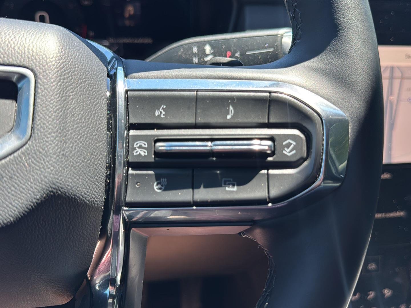 Used 2025 Ebony Twilight Metallic GMC AWD Elevation image 31