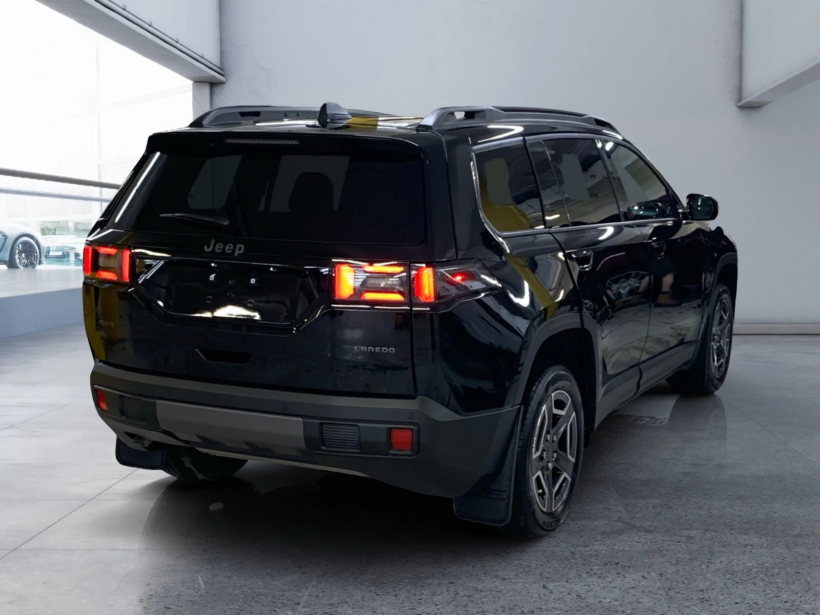 New 2026 Diamond Black Crystal Pearl Jeep Laredo image 5