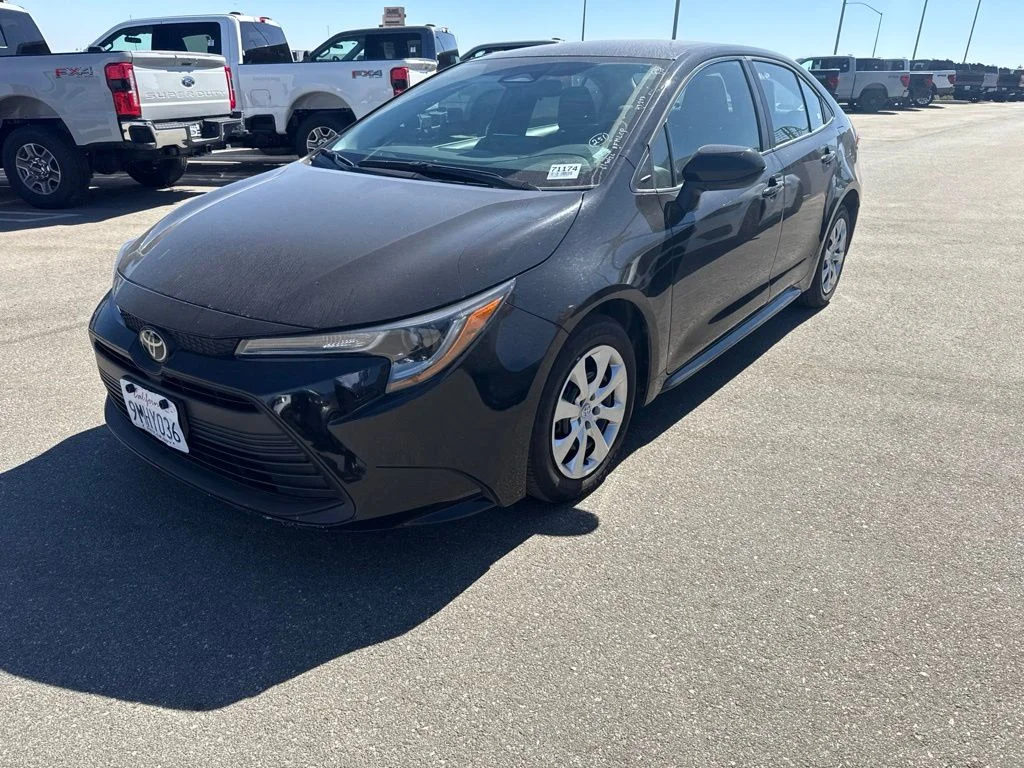 Used 2024 Midnight Black Metallic Toyota LE image 3