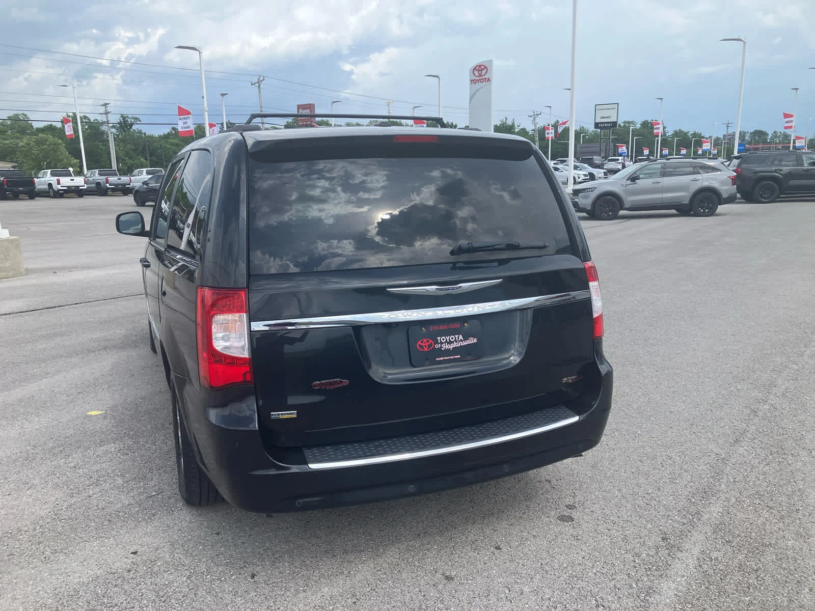 Used 2013 Brilliant Black Crystal Pearl Chrysler Touring image 6