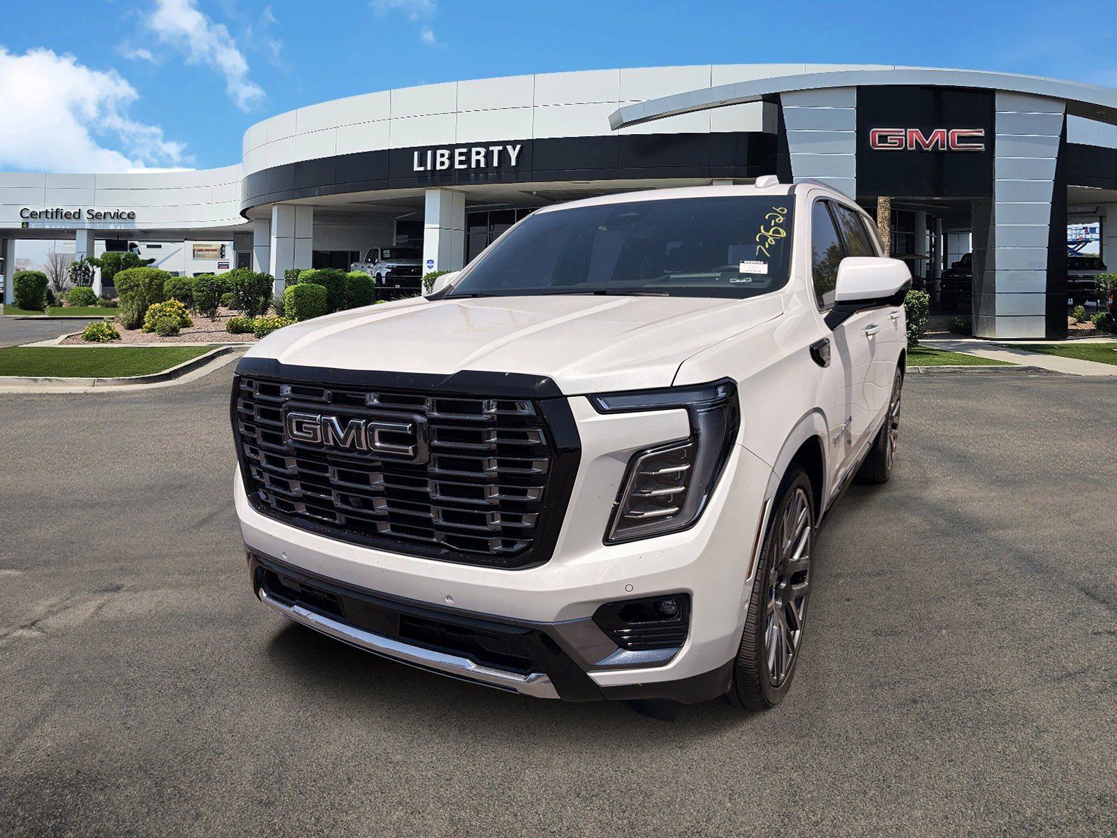 Used 2025 White Frost Tricoat GMC Denali Ultimate image 4