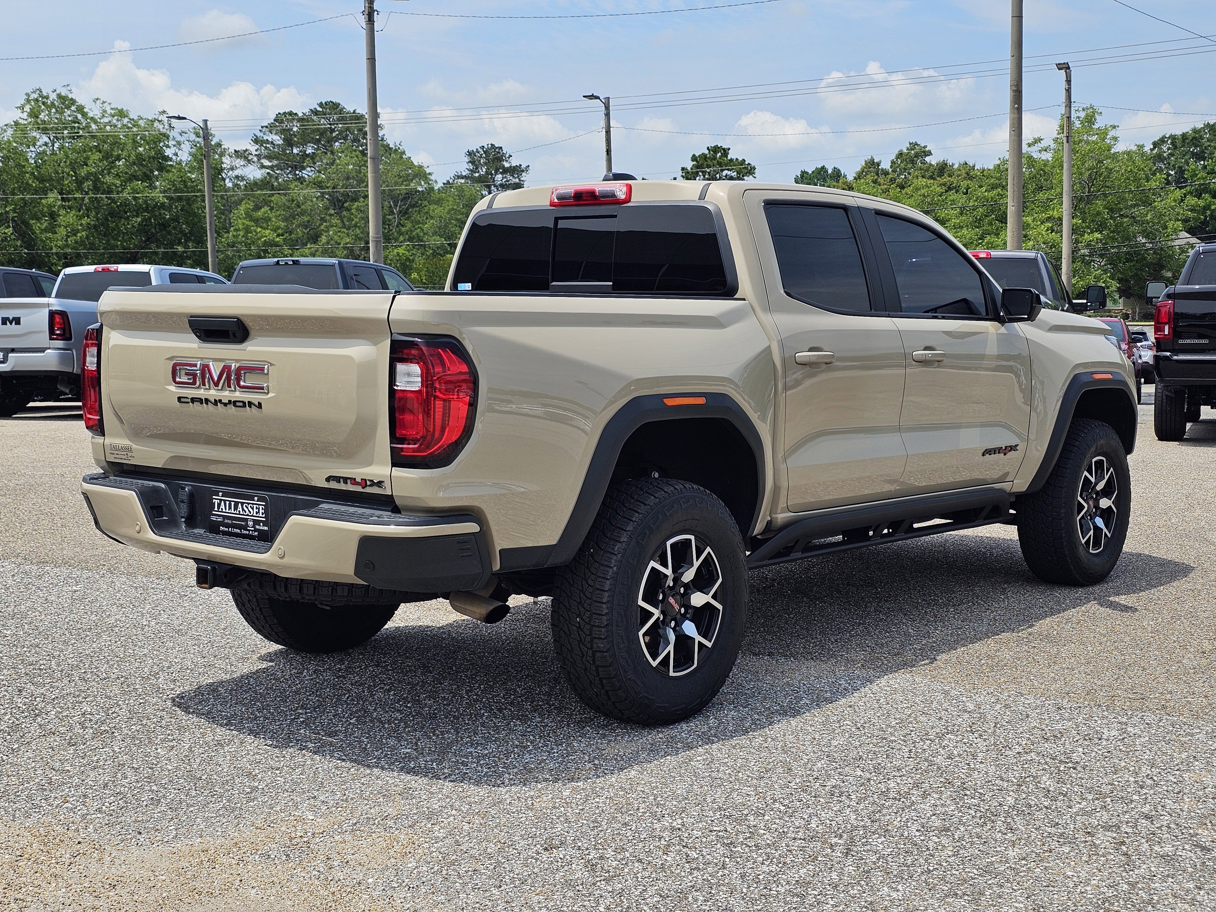 Used 2023 Desert Sand Metallic GMC 4WD AT4X image 9