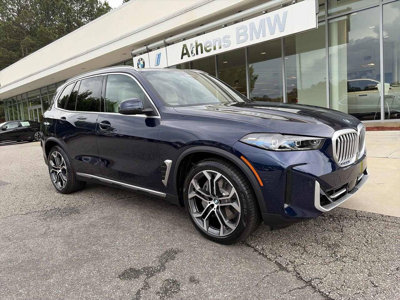 New 2026 Tanzanite Blue II Metallic BMW xDrive50e image 2