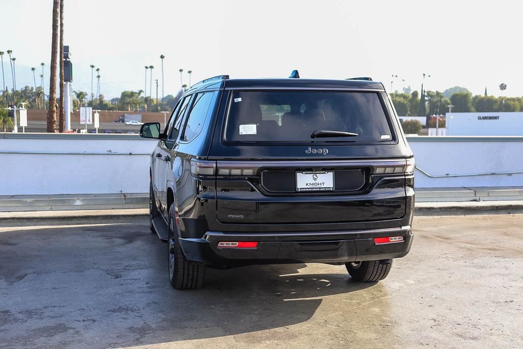 New 2026 Black Jeep Limited Altitude image 7