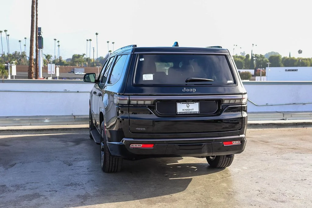 New 2026 Black Jeep Limited Altitude image 7