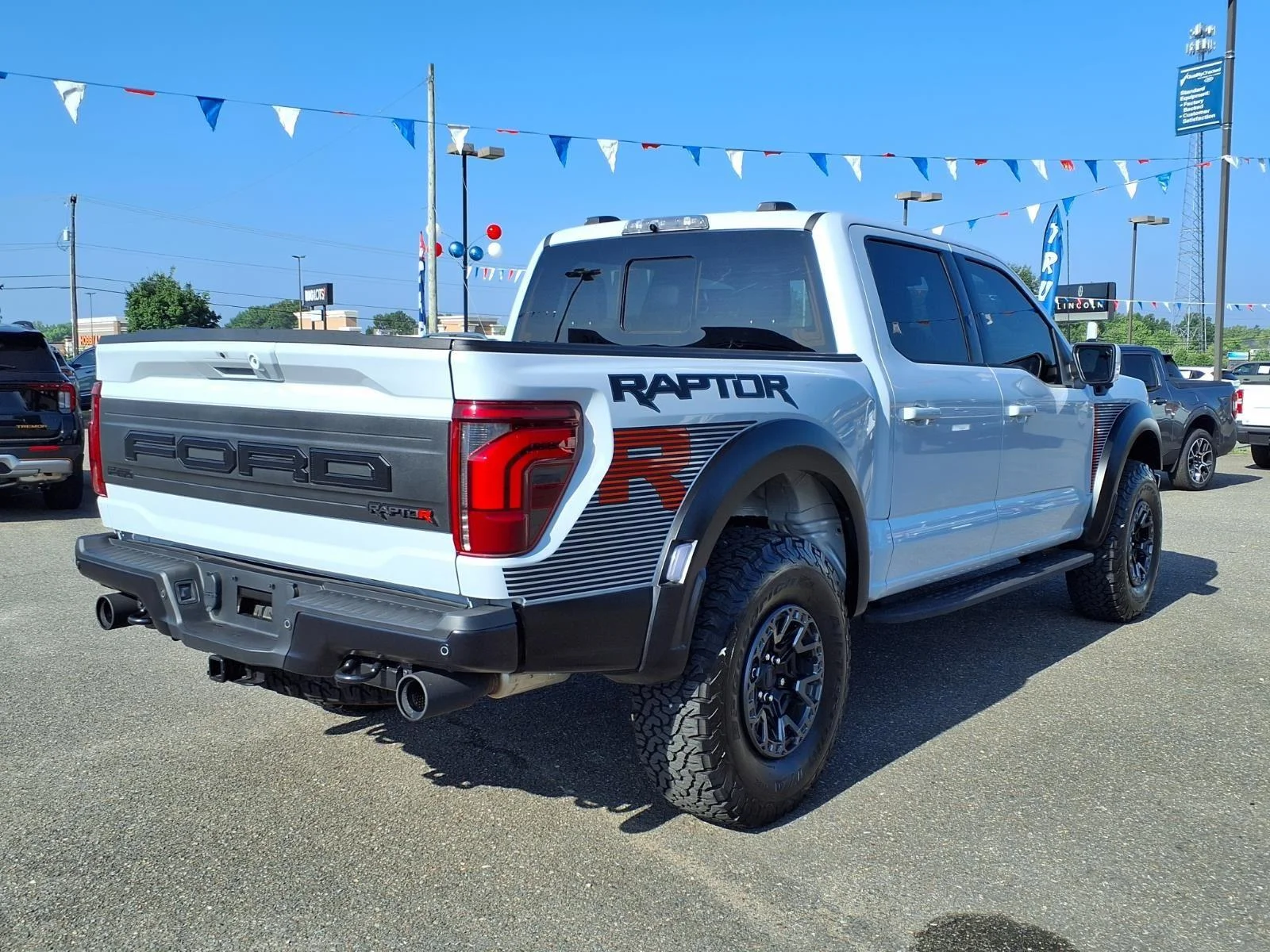 Used 2025 Space White Metallic Ford Raptor image 2