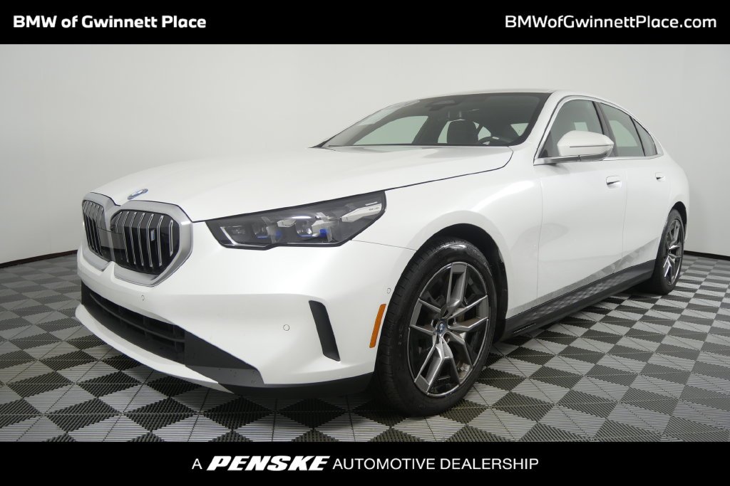 Certified Used 2024 White Metallic BMW eDrive40 image 1