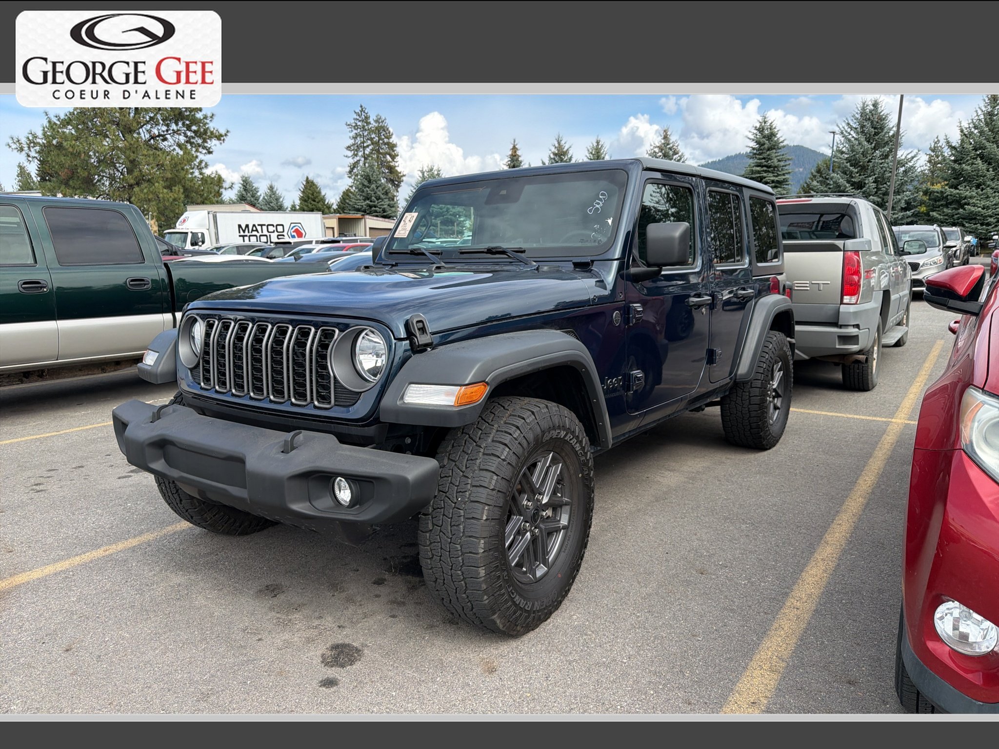 Used 2025 Fathom Blue Pearlcoat Jeep Sport S image 1