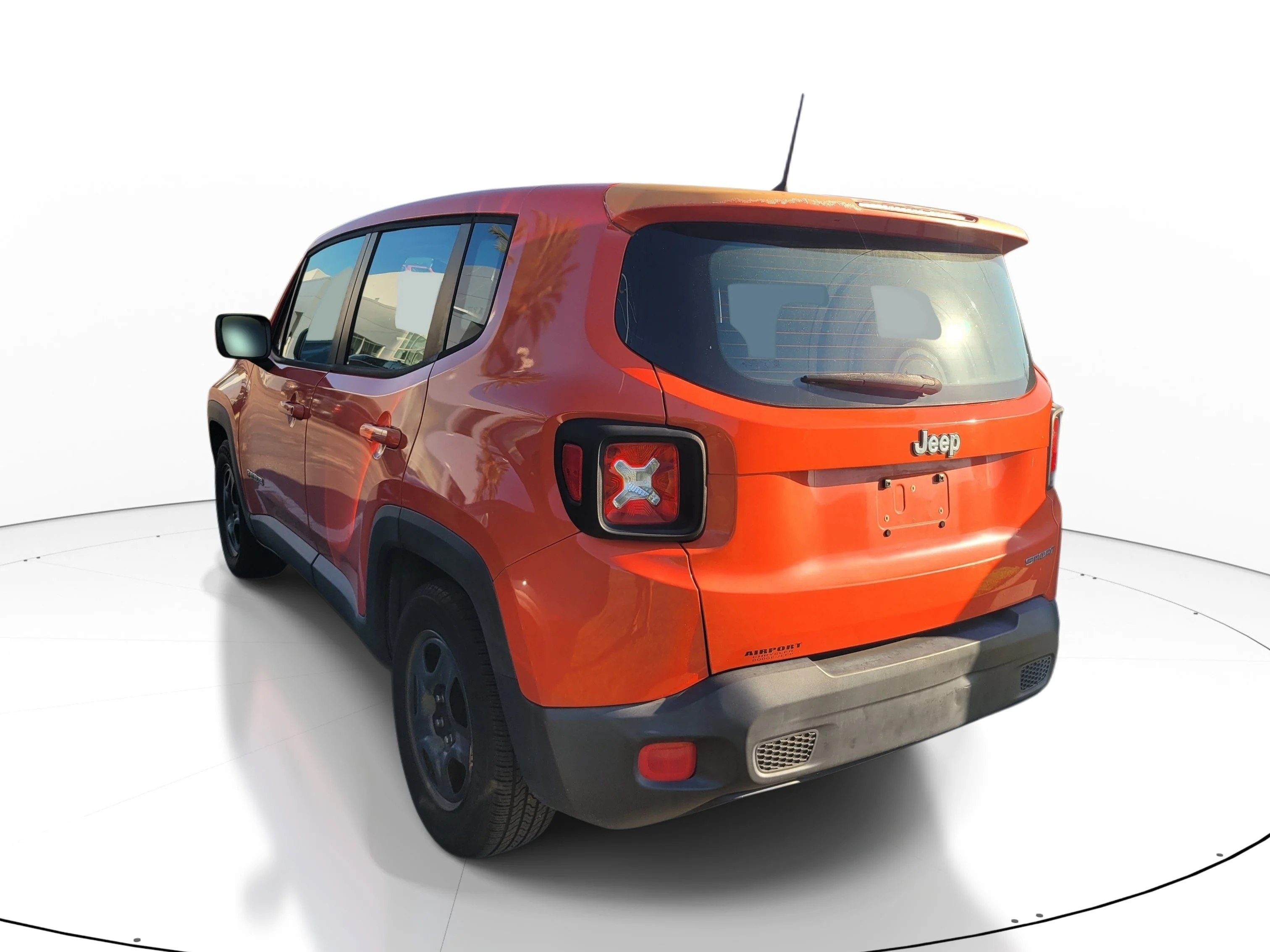 Used 2016 Omaha Orange Jeep Sport image 6