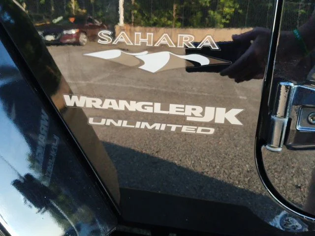 Used 2018 Black Jeep Unlimited Sahara image 11