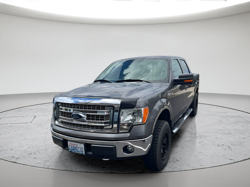 Used 2013 Tuxedo Black Metallic Ford XLT image 1