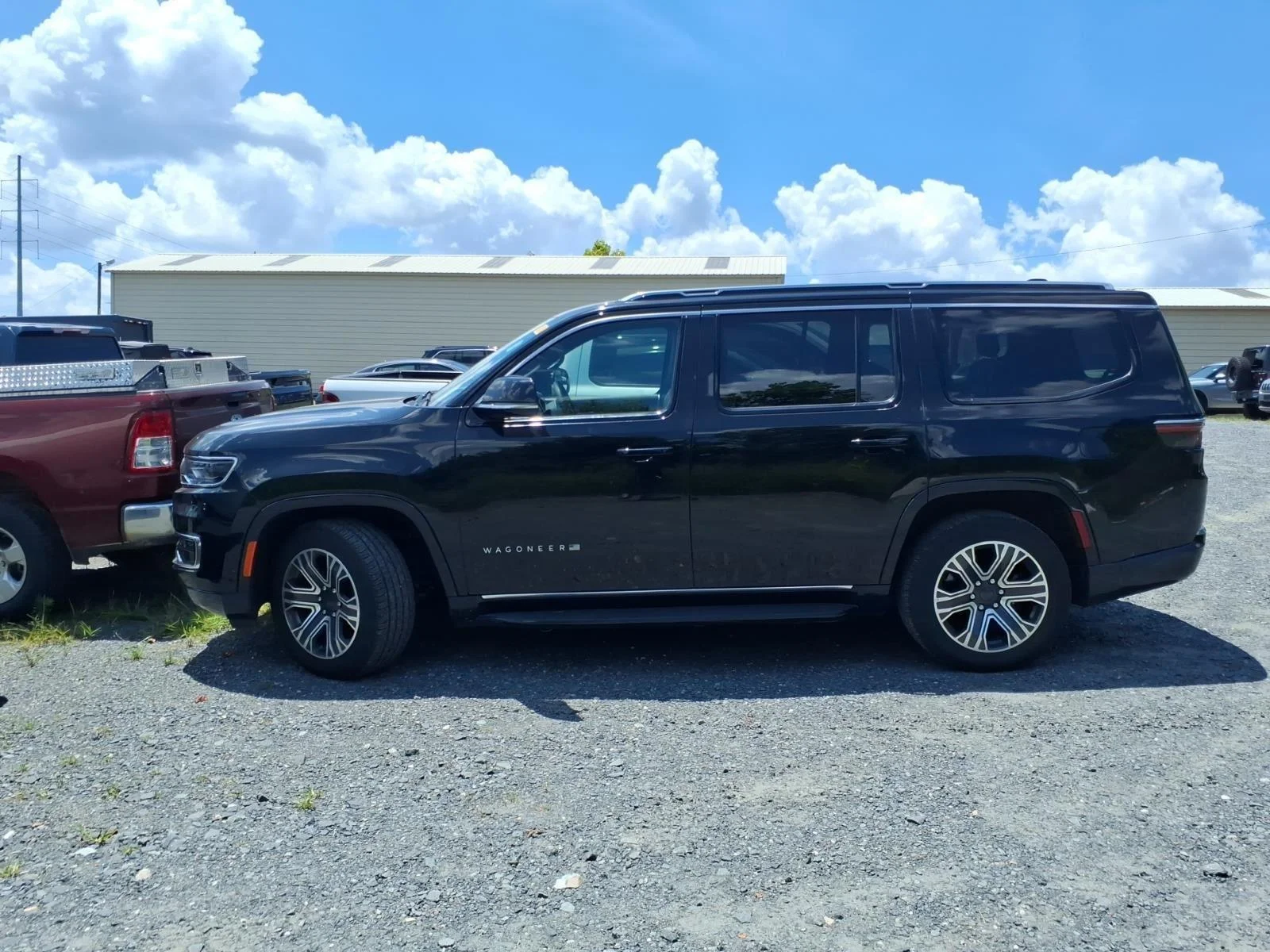 Used 2024 Diamond Black Crystal Pearlcoat Jeep Series II image 4