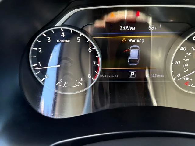 Used 2017 Magnetic Black Metallic Nissan SV image 20