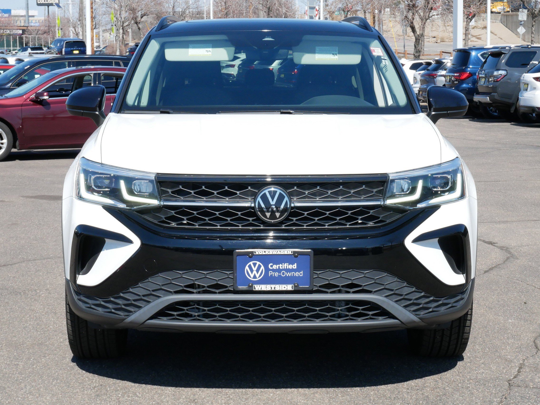 Certified 2024 Volkswagen Taos SE Black with VIN 3VVLX7B24RM112537 for sale in Saint Louis Park, Minnesota