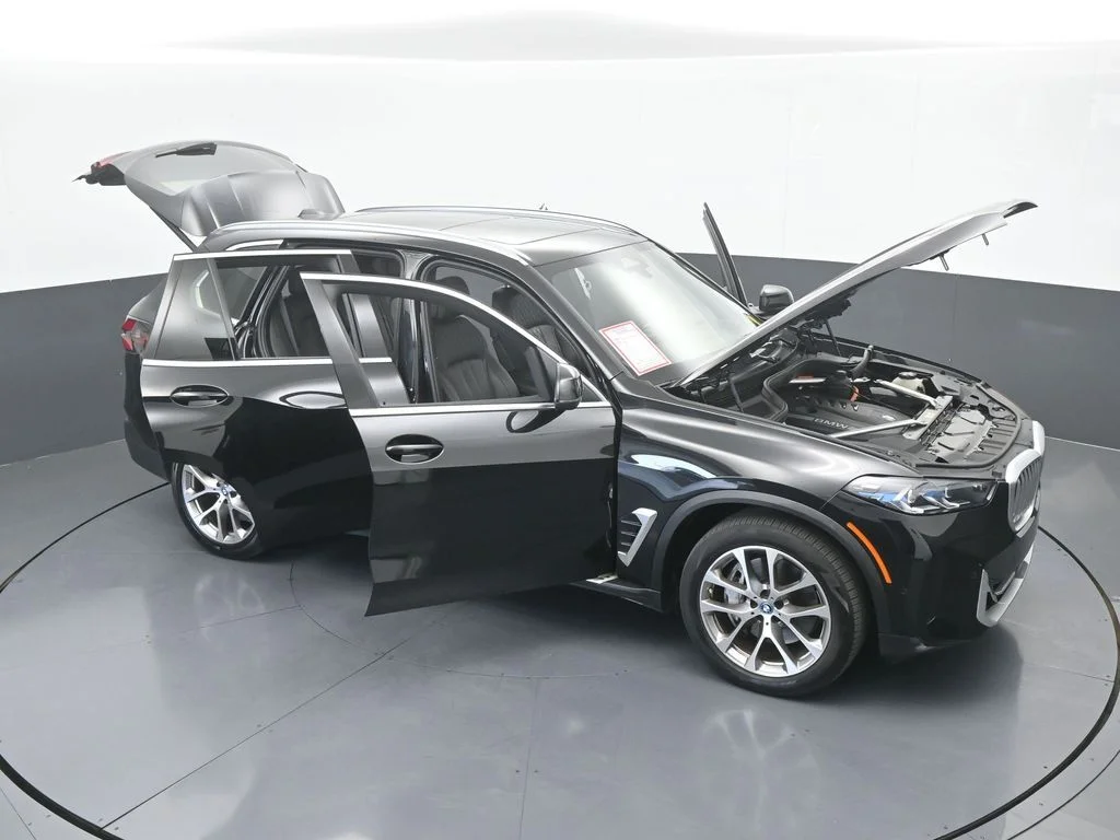 Used 2025 Black Sapphire Metallic BMW xDrive50e image 76