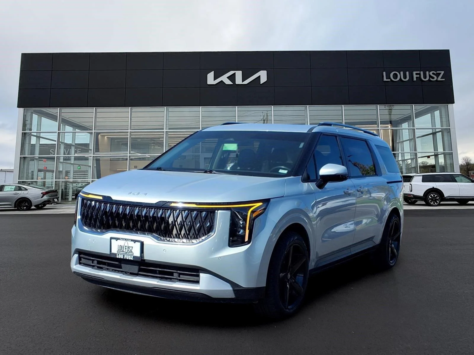 Used 2025 Ivory Silver Gloss Kia EX image 1