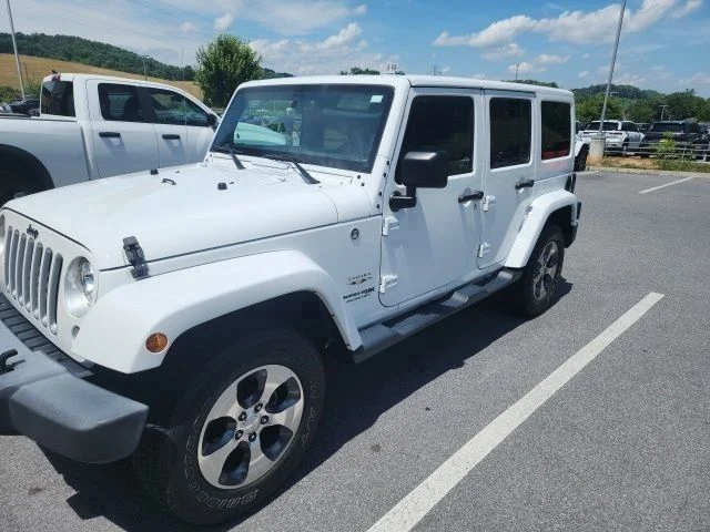Used 2018 White Jeep Unlimited Sahara image 2