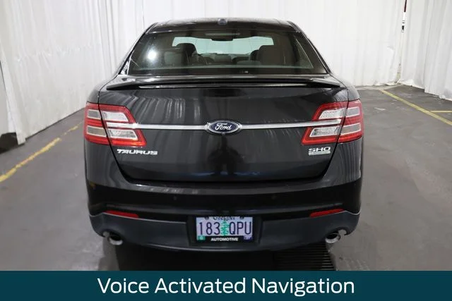 Used 2014 Tuxedo Black Metallic Ford SHO image 4