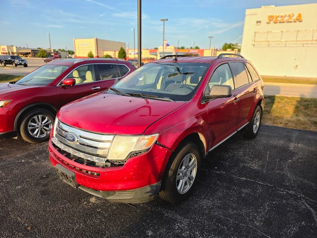 Used 2010 Red Candy Metallic w/Tinted Clearcoat Ford SE image 2