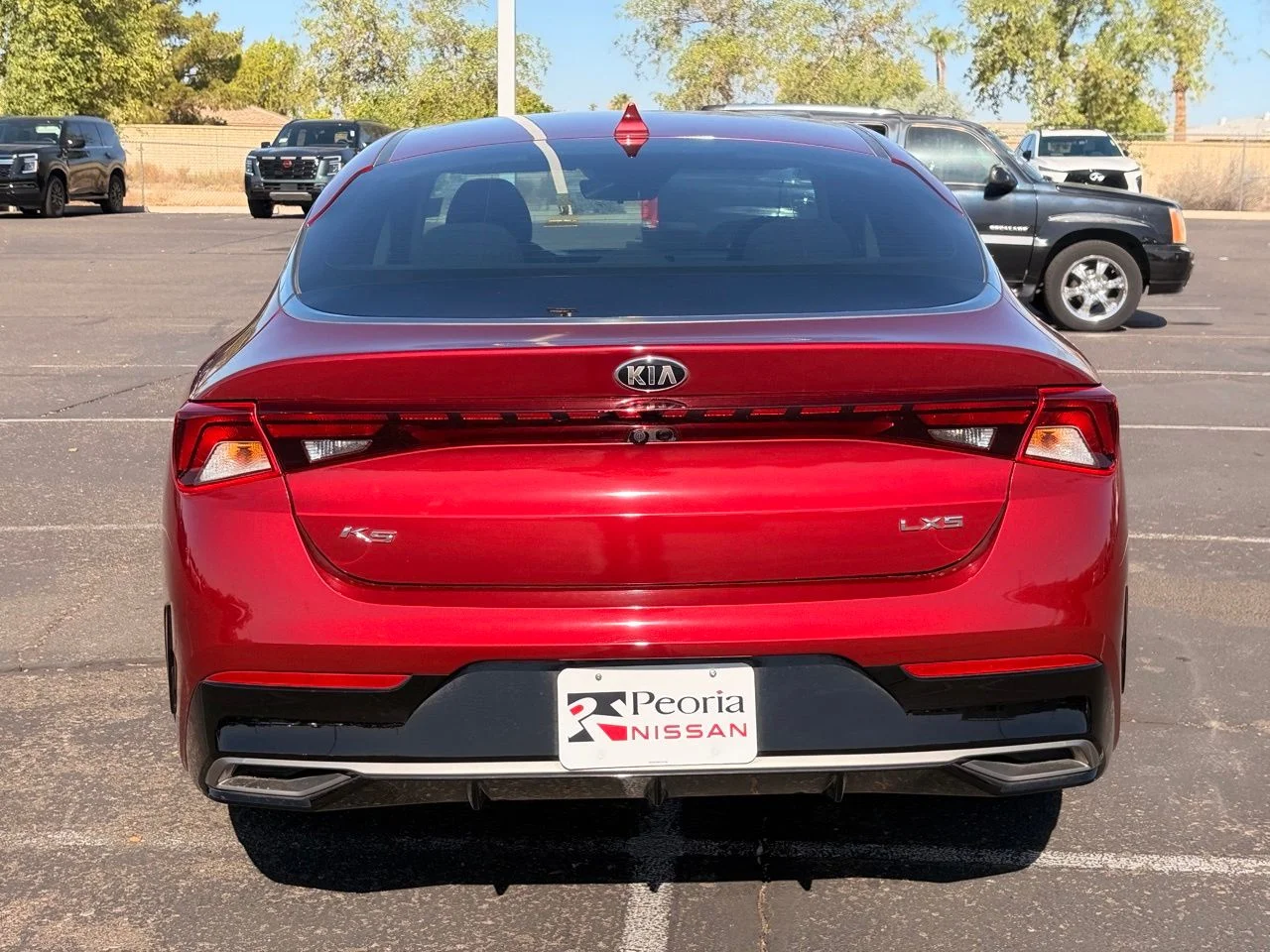 Used 2021 Passion Red Kia LXS image 4