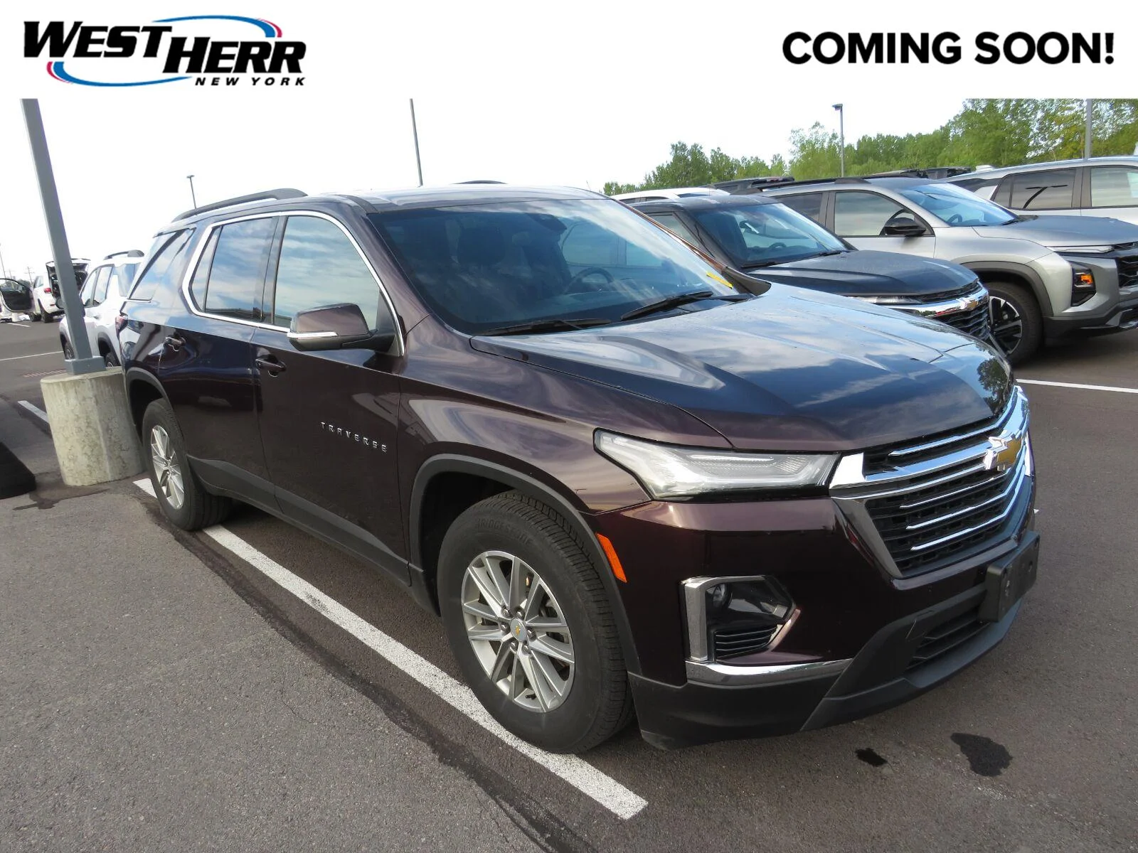 Used 2023 BLACK CHERRY METALLIC Chevrolet LT Cloth image 1