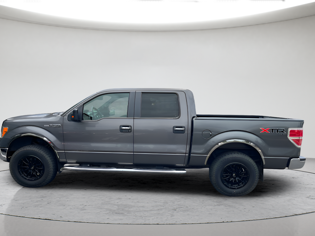 Used 2013 Tuxedo Black Metallic Ford XLT image 8