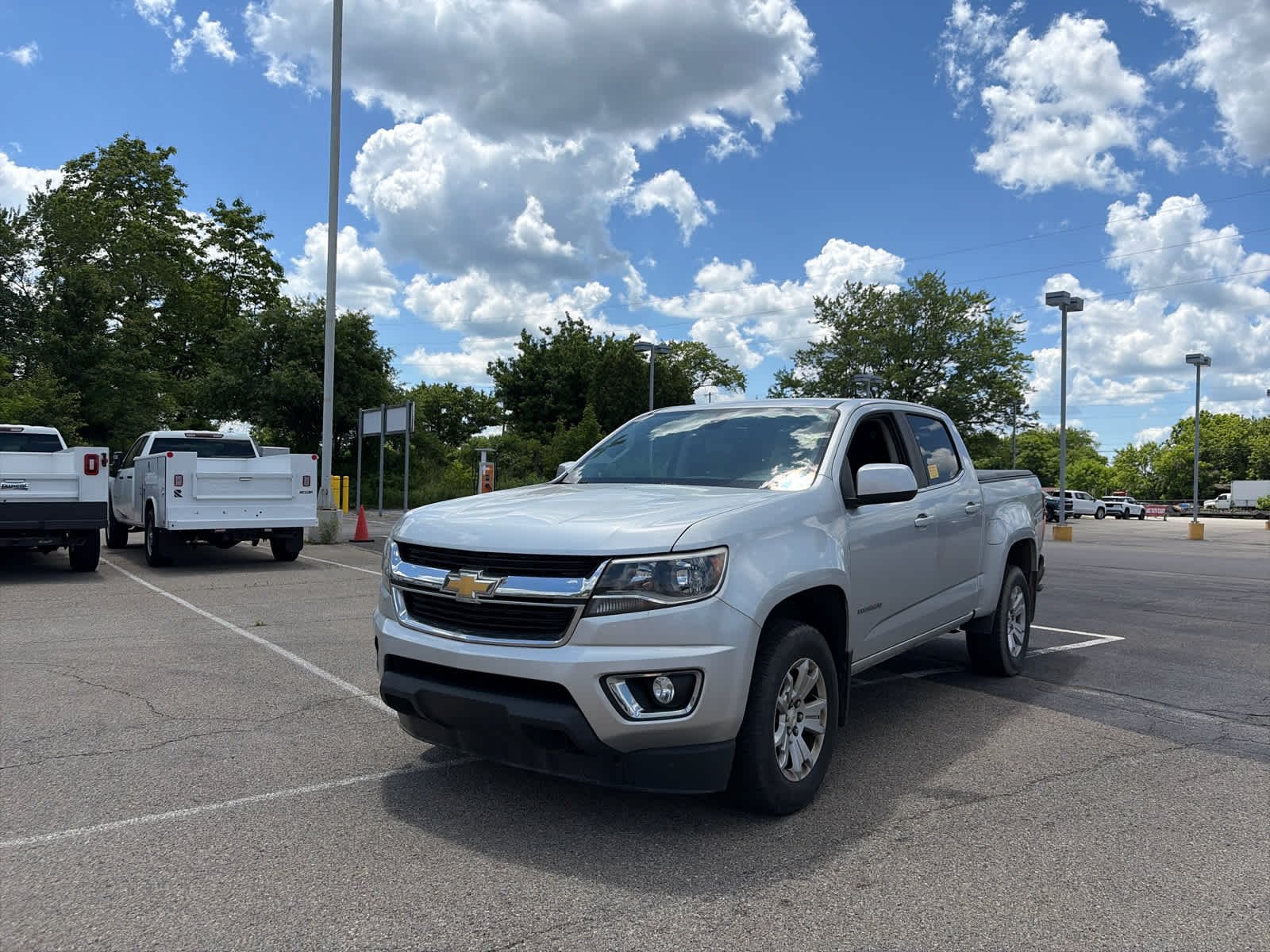 Used 2016 SILVER ICE METALLIC Chevrolet 4WD LT image 1