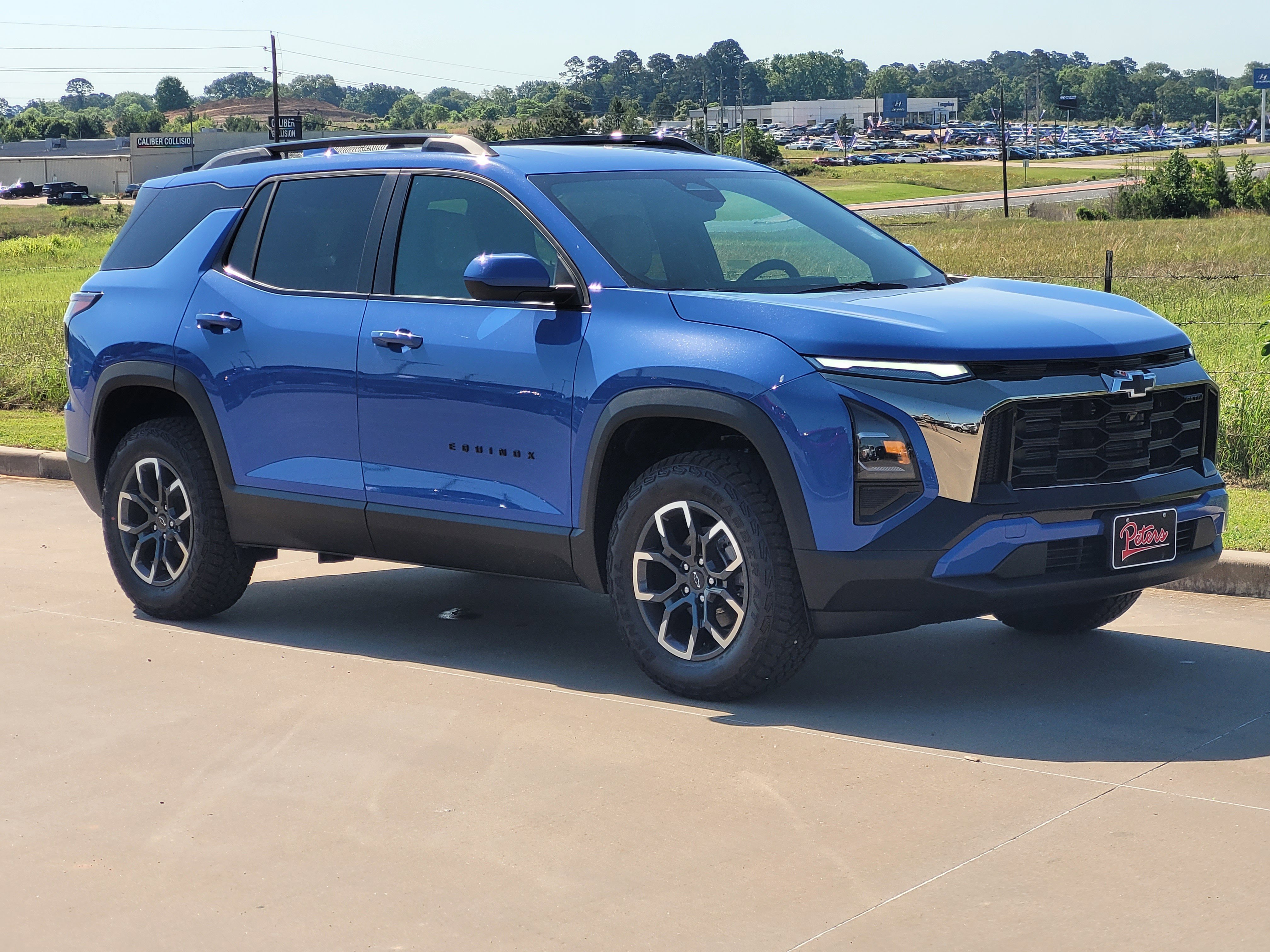 New 2026 Reef Blue Metallic Chevrolet AWD ACTIV image 1