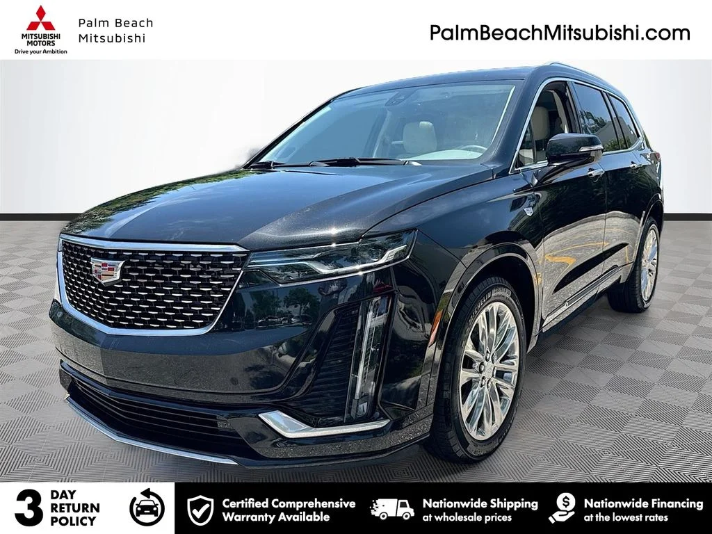 Used 2024 Black Cadillac Premium Luxury image 1