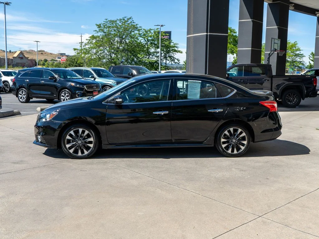Used 2019 Black Nissan SR image 4