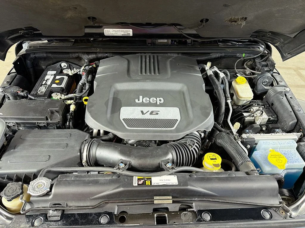Used 2015 Black Jeep Unlimited Sahara image 25
