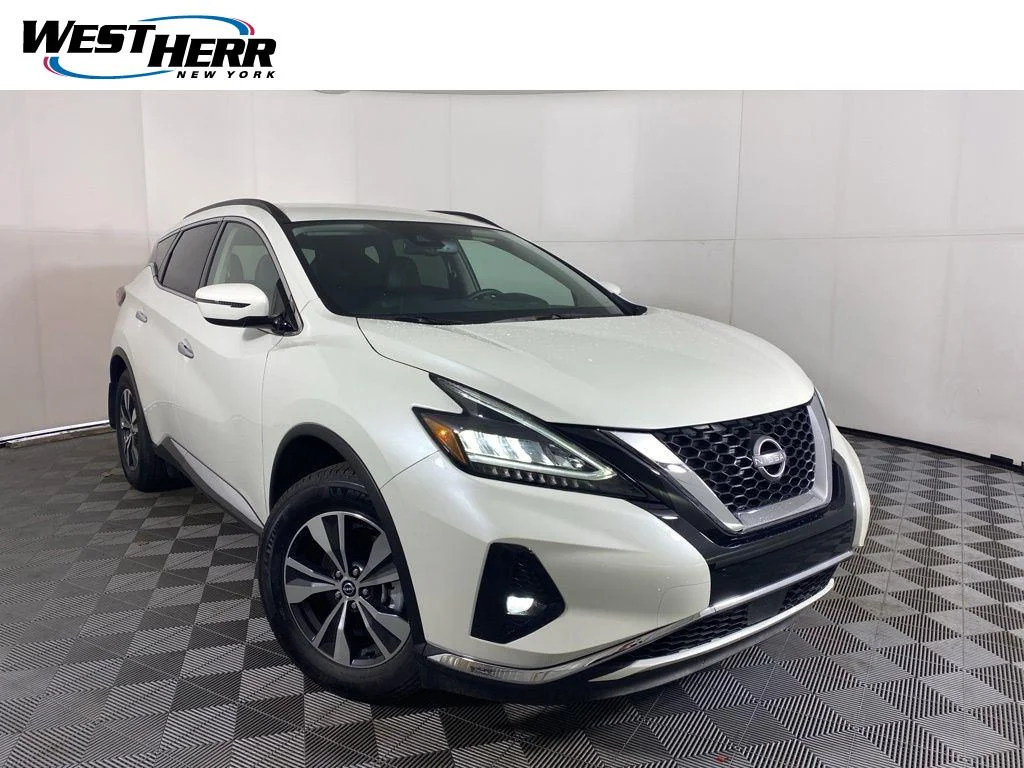 Used 2024 Pearl White Nissan SV image 1