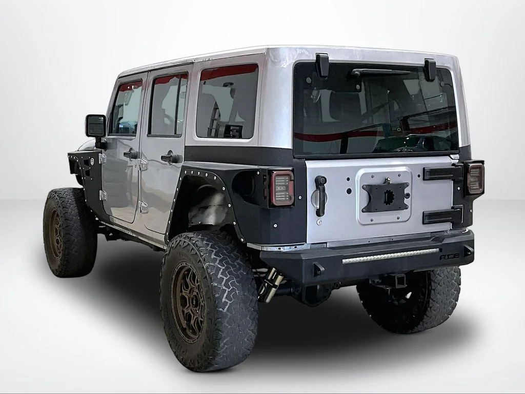 Used 2015 Silver Jeep Unlimited Sport image 12