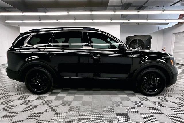 Used 2024 Ebony Black Kia SX-Prestige X-Pro image 16