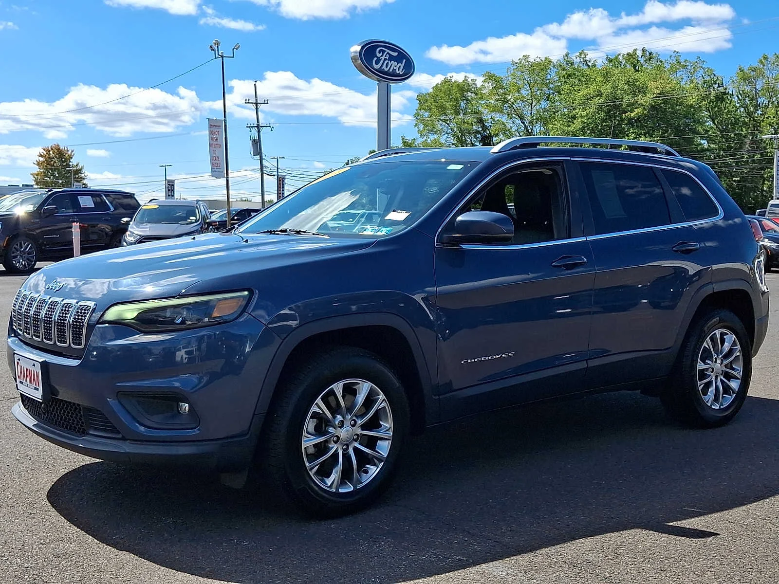 Used 2021 Slate Blue Pearlcoat Jeep Latitude Lux image 3