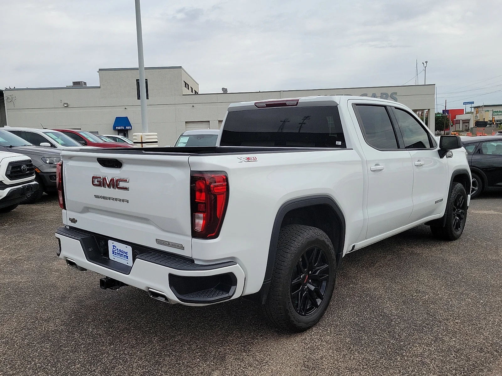 Certified Used 2024 Summit White GMC 4WD Crew Cab Short Box Elevation with 3SB image 11