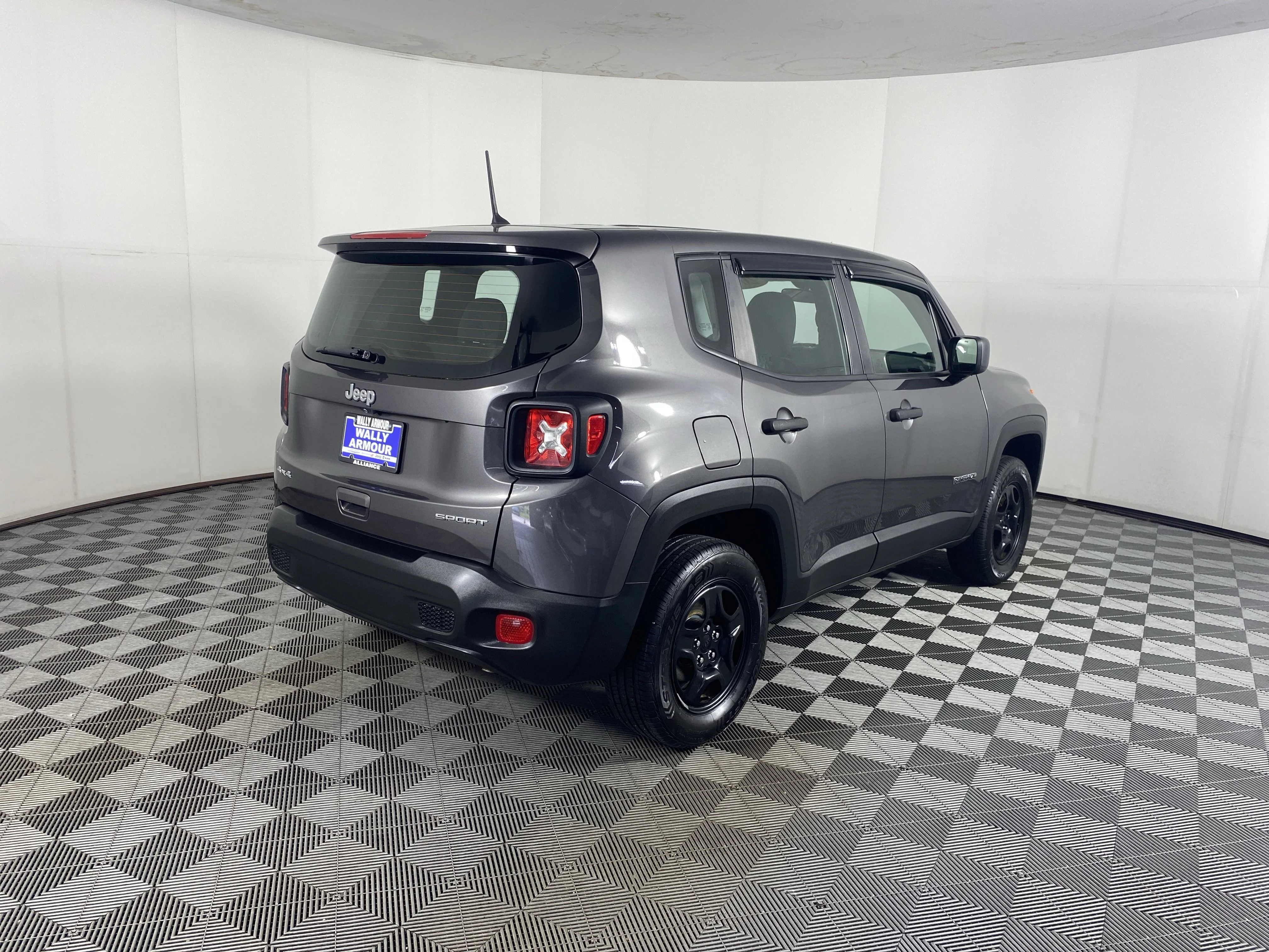 Used 2019 Granite Crystal Metallic Clearcoat Jeep Sport image 6