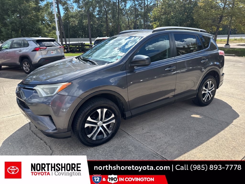 Used 2016 Gray Toyota LE image 1
