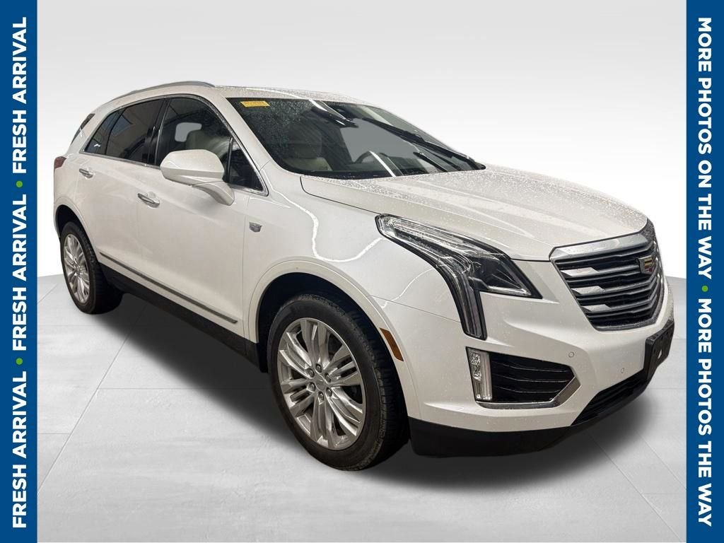 Used 2017 White Cadillac Premium Luxury image 1