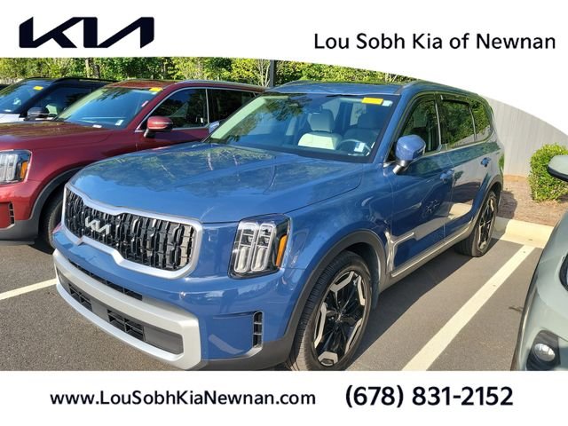 Used 2025 Midnight Kia EX image 1