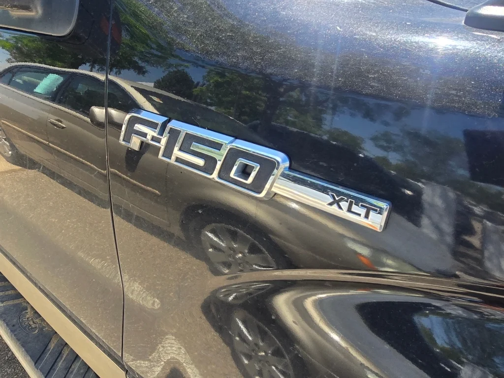 Used 2011 Tuxedo Black Metallic Ford XLT image 9